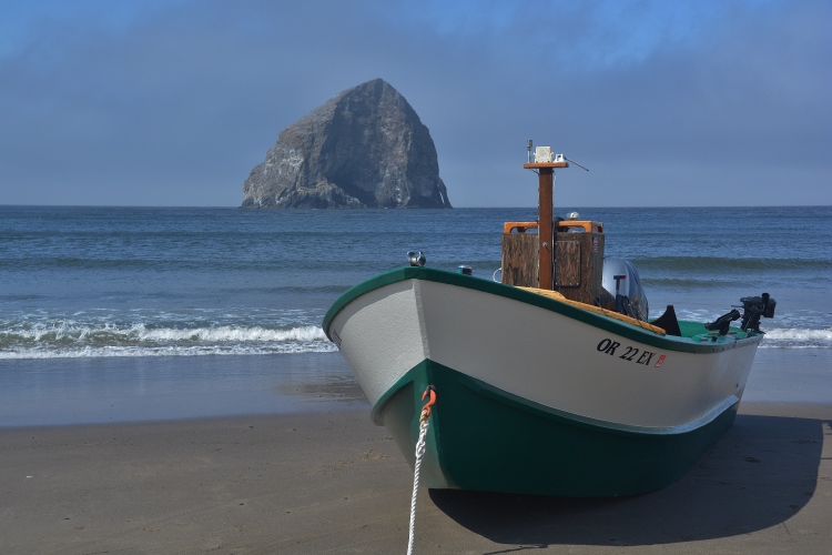 dory boat on water's edge